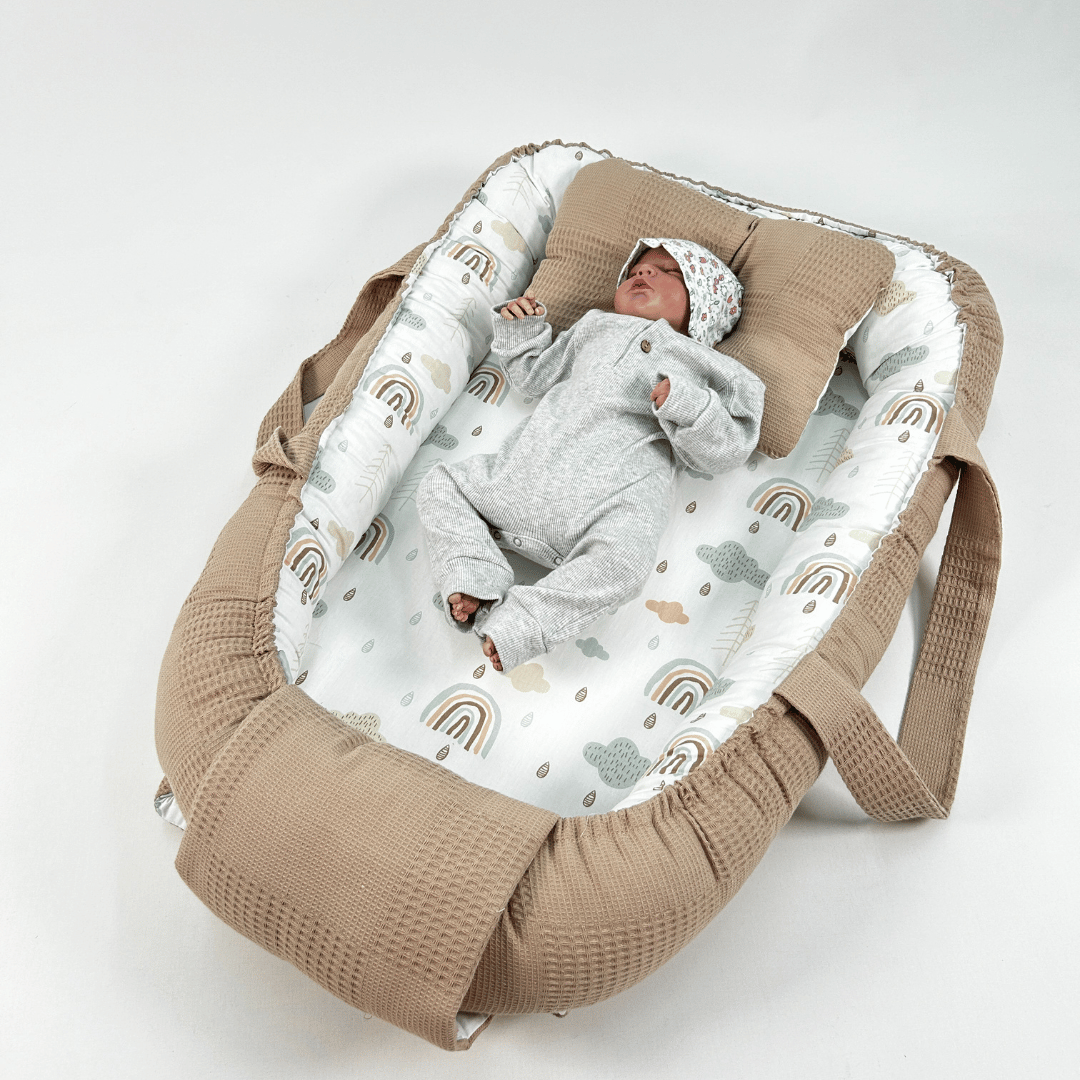 Baby deluxe snuggle nest on sale